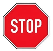 Biển báo dừng (R.122) hình lục giác màu đỏ với chữ "STOP" màu trắng, yêu cầu mọi phương tiện, kể cả xe ưu tiên, phải dừng lại.