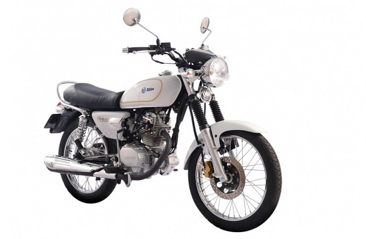 Cận cảnh cụm đèn pha tròn và đồng hồ hiển thị cổ điển của SYM Husky Classic 125