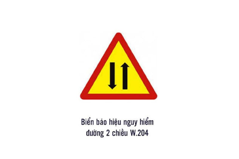 Chi tiết biển báo W.204 chỉ báo đường 2 chiều, hai mũi tên ngược chiều.