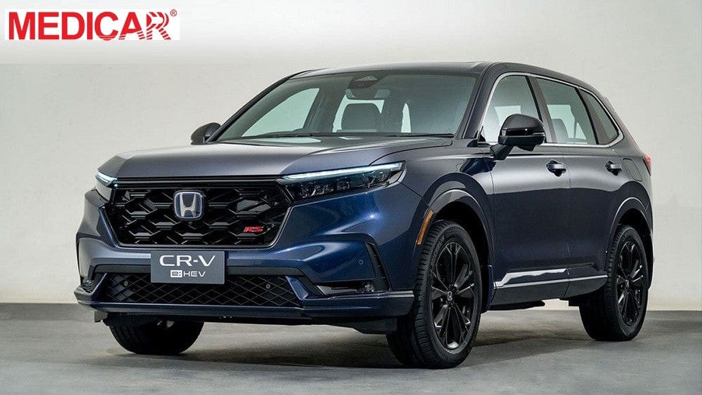 Dòng xe Honda CR-V màu đỏ đang di chuyển, một ví dụ về dòng xe ô tô phổ biến ở Việt Nam với sự bền bỉ