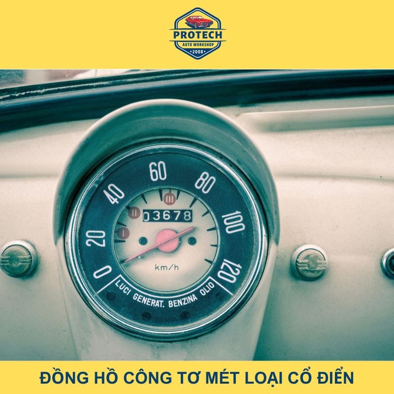 Hình ảnh cận cảnh đồng hồ công tơ mét cơ học cổ điển trên xe ô tô, hiển thị kim chỉ tốc độ và quãng đường.