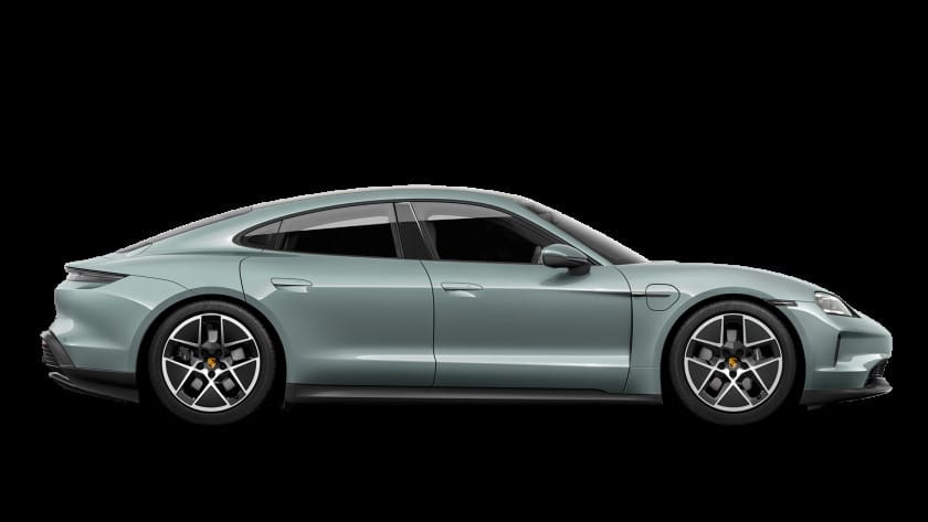 Mẫu xe ô tô Porsche Taycan màu xanh ngọc lam đang sạc điện tại trạm