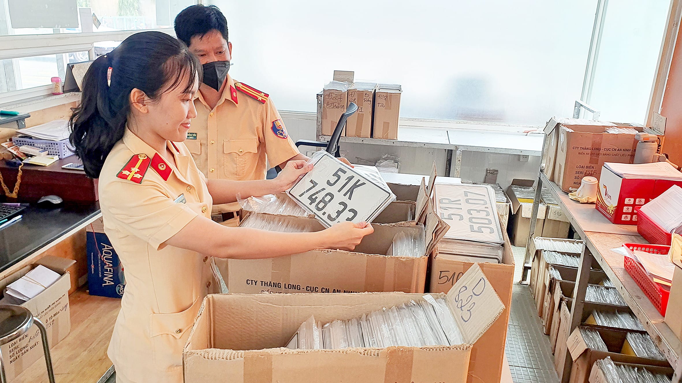 Người dân thực hiện thủ tục đổi giấy phép lái xe tại TPHCM
