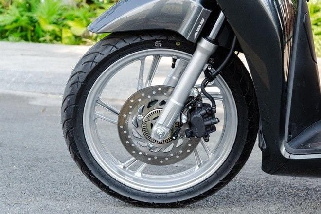 Sơ đồ chi tiết cơ chế hoạt động của hệ thống phanh ABS trên bánh xe, minh họa cách chống bó cứng hiệu quả.