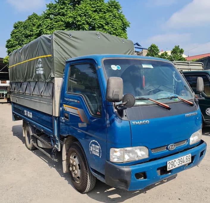 Xe tải Kia K125 đời 2014 thùng mui bạt màu xanh