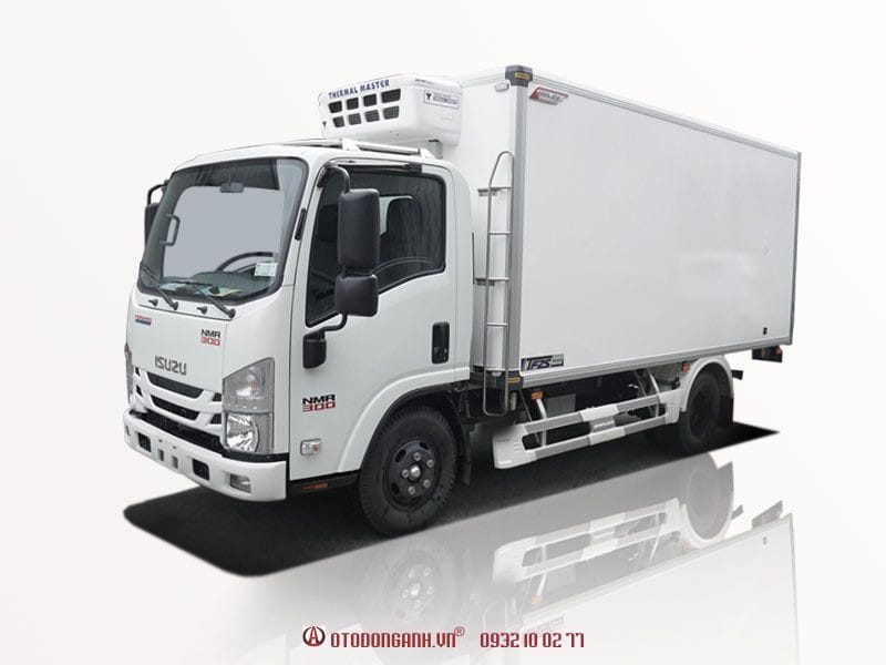 Xe tải thùng đông lạnh màu trắng đậu bên ngoài, thể hiện cấu trúc đóng thùng đông lạnh